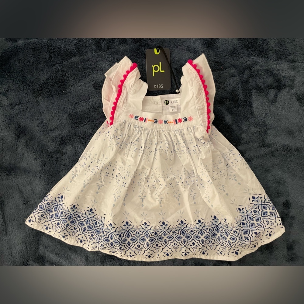 New with tag adorable baby dress size 6M